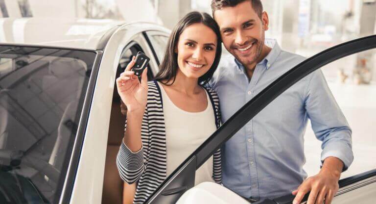 Couple Holding Car Keys